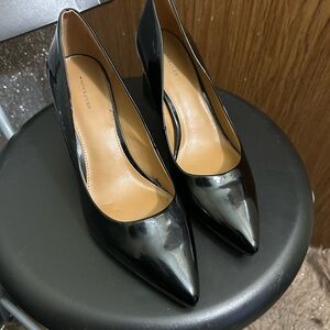 Black Patent Leather Pumps. Fashionable heel and pointed toe. Like new
